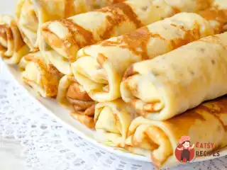 Млинці з горіхово-сирною начинкою