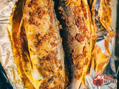 Сибас з часником, лимоном та оливковою олією
