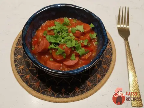 Сосиски, тушковані з овочами