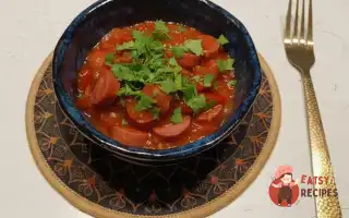 Сосиски, тушковані з овочами