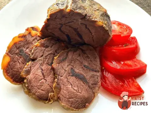 Яловича рулька з апельсиновою цедрою