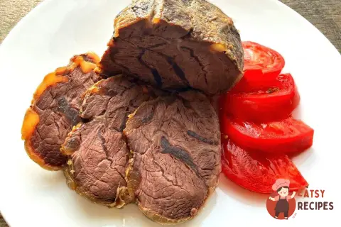 Яловича рулька з апельсиновою цедрою