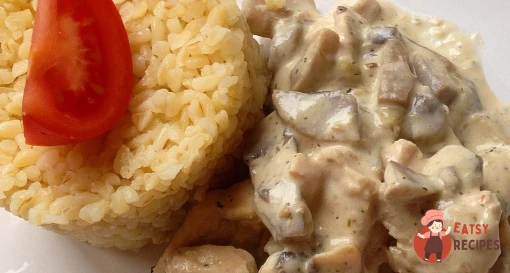 Індичка з грибами у вершковому соусі з булгуром