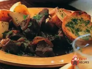 Яловичина тушкована в пиві гіннес