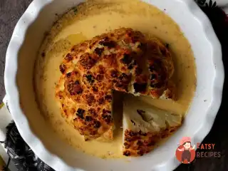 Запечена цілком цвітна капуста у сирно-пивному соусі