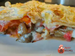 Лазанья з грибами й помідорами