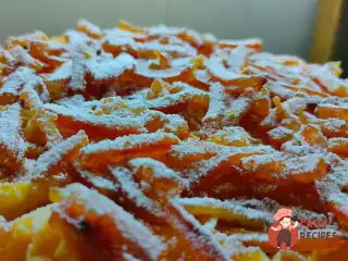 Пиріг на кефірі з мандаринами та цукатами