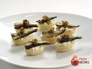 Тарталетки зі шпротами