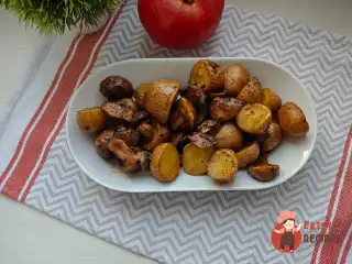 Запечена картопля з печерицями