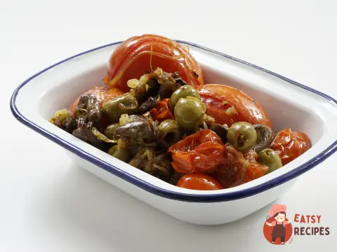 Курячі серця на сковороді із запеченими томатами