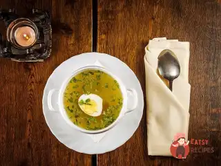 Курячий бульйон з рисом та яйцями