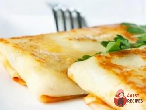 Млинці (пельмені) з начинкою з курячого м'яса