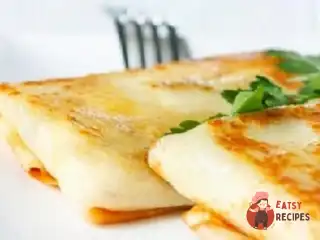 Млинці (пельмені) з начинкою з курячого м'яса
