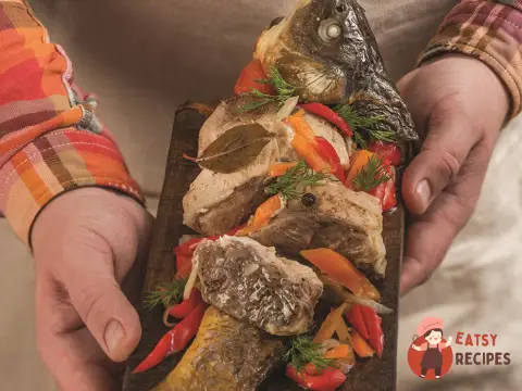 Товстолобик, томлений з корінням