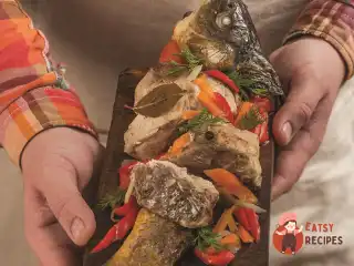 Товстолобик, томлений з корінням