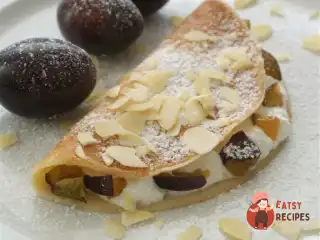 Млинці з сиром та сливою