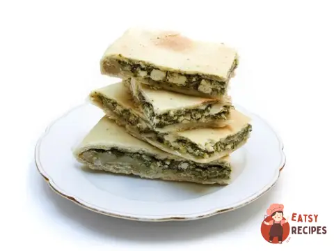 Пиріг зі шпинатом, цукіні, рисом та фетою