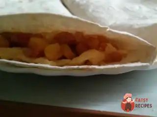 Тортілья з шинкою, сиром та овочами