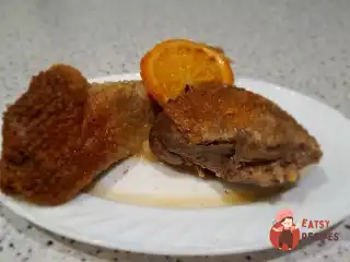 Качка з апельсином у рукаві