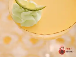 Апельсиновий поссет із лаймовими збитими вершками