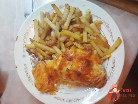 Кролик, запечений зі сметаною та сиром