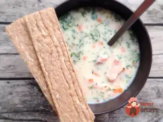 Вершкове вухо з двома видами риби