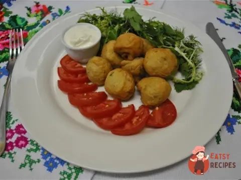 Гриби у клярі зі сметаною