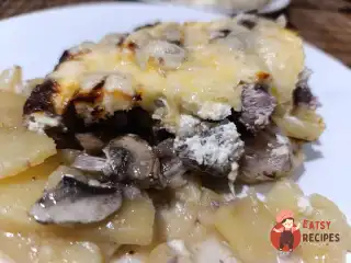 Яловичина по-французьки з грибами