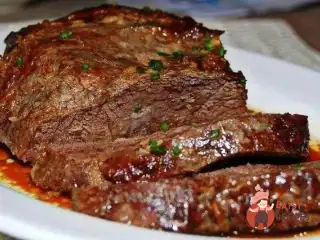 Телятина тушкована у пиві