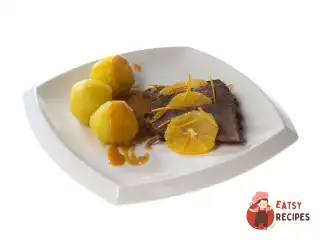 Яловичина, тушкована з апельсинами