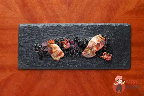 Кальмари з чечевичним різотто та пудрою з лука-порею