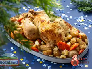 Курка з сиром у духовці на подушці з овочів