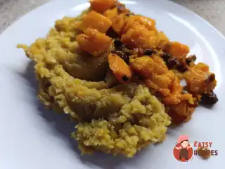 Запечений гарбуз із сочевицею та родзинками