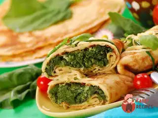 Млинці зі шпинатом та чотирма сирами