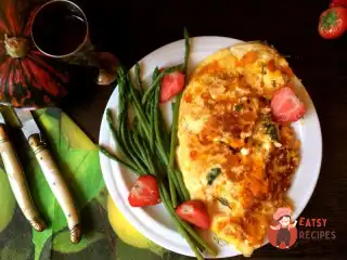 Омлет з гарбузом, сиром та апельсиновим лікером