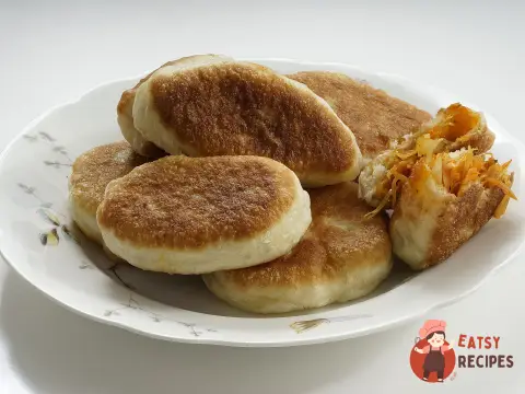 Смажені пиріжки з капустою