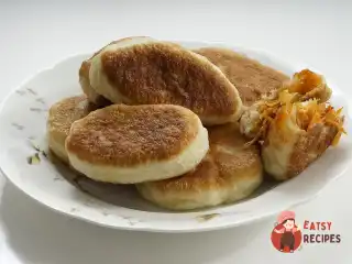 Смажені пиріжки з капустою