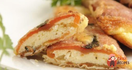 Смажені, фаршировані козиним сиром, перці та оливки