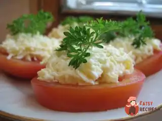 Помідори з сиром та часником
