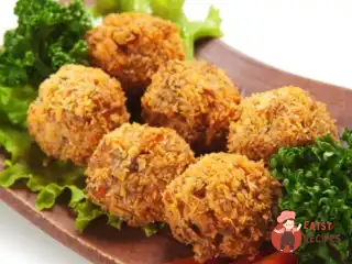 Аранчі із зеленим горошком та моцарелою