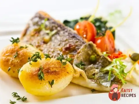 Смажений сибас з овочами
