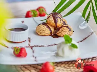 Апельсинові профітролі