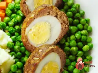 Яйця по-шотландськи зі свинячим фаршем
