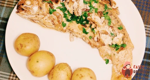 Райдужна форель у грибному соусі