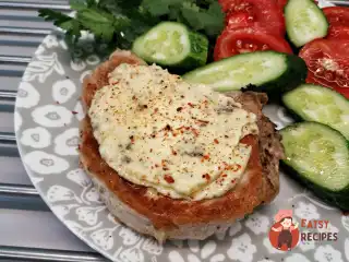 Свиняча корейка в соусі дорблю