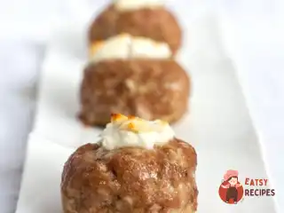 Зрази з грибами під грибним соусом