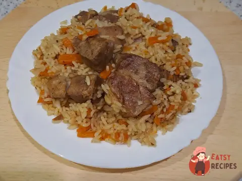 Плов зі свинячого ошийка на сковороді