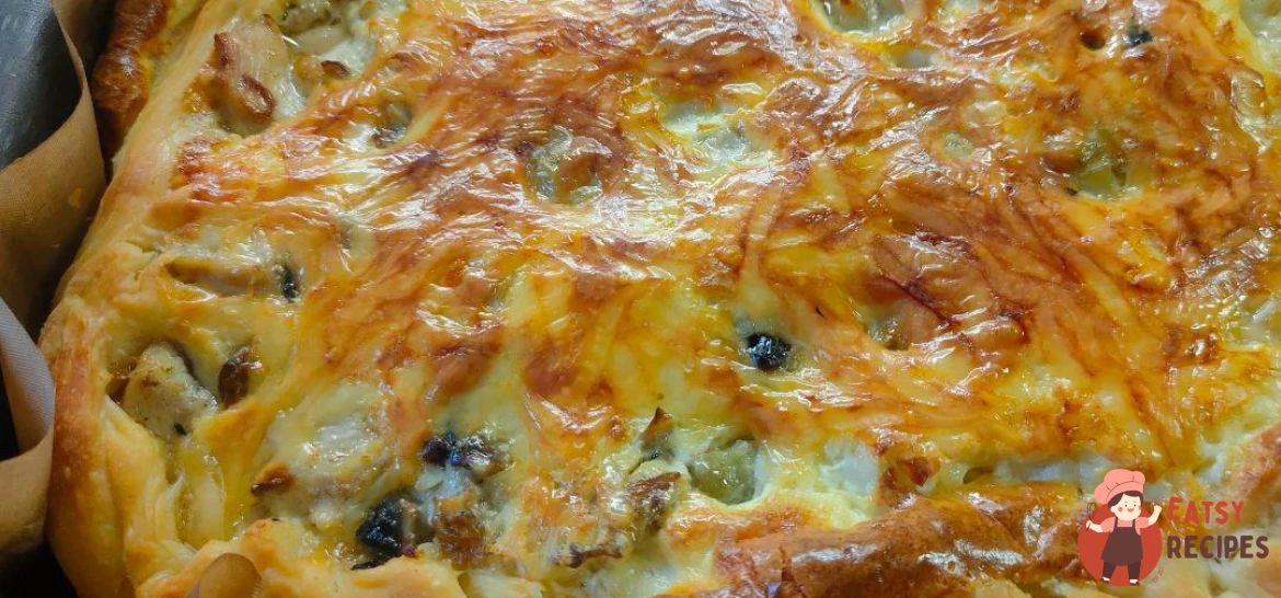Лоранський пиріг із листкового тіста з куркою та грибами