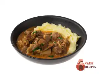 Тушкована свинина