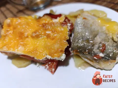 Риба по-французьки з помідорами
